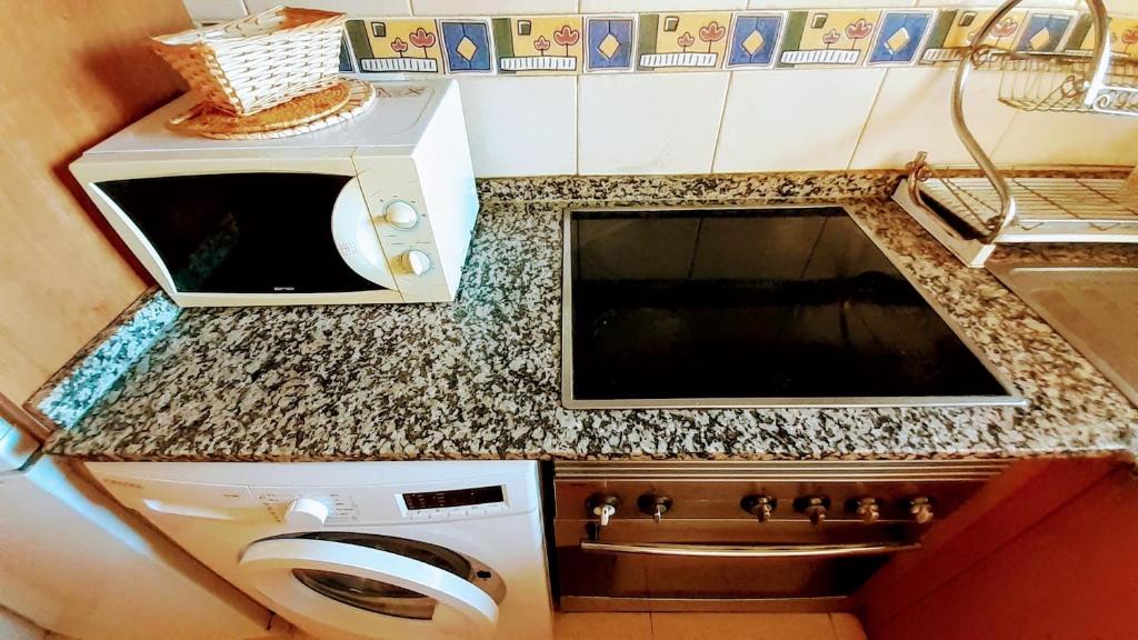Kuchyň nebo kuchyňský kout v ubytování Apto Mar del Este alquiler semanal solo familias