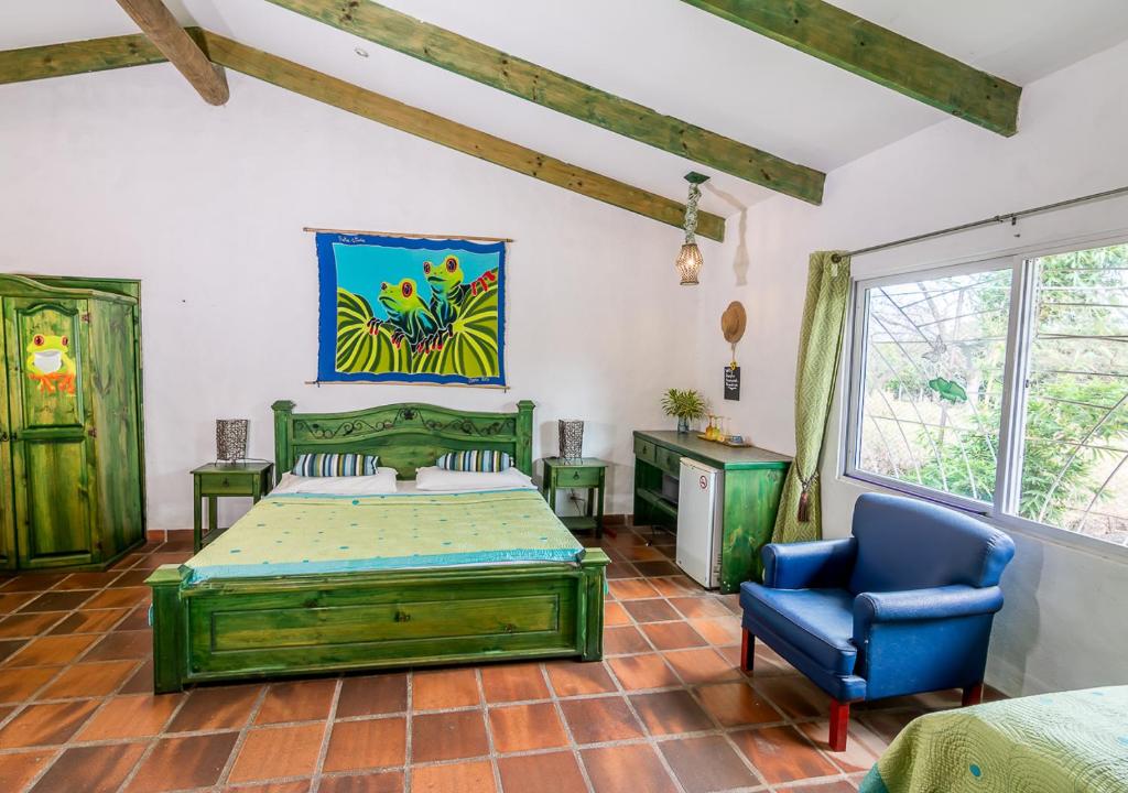 Postel nebo postele na pokoji v ubytování Villa Margarita