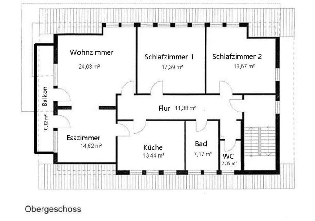 a black and white floor plan of a house at Business Apartment Aida in Baiersbronn