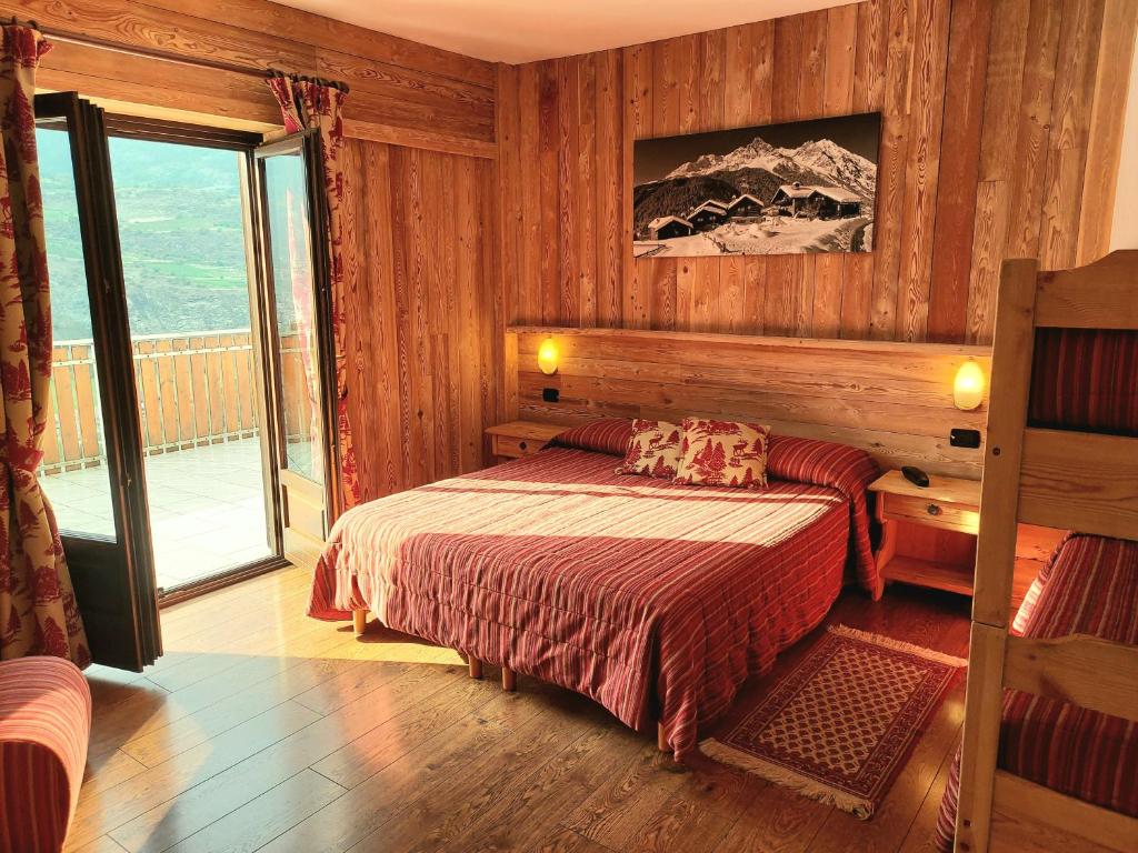 Postel nebo postele na pokoji v ubytování Hotel Rendez-Vous - Aymavilles