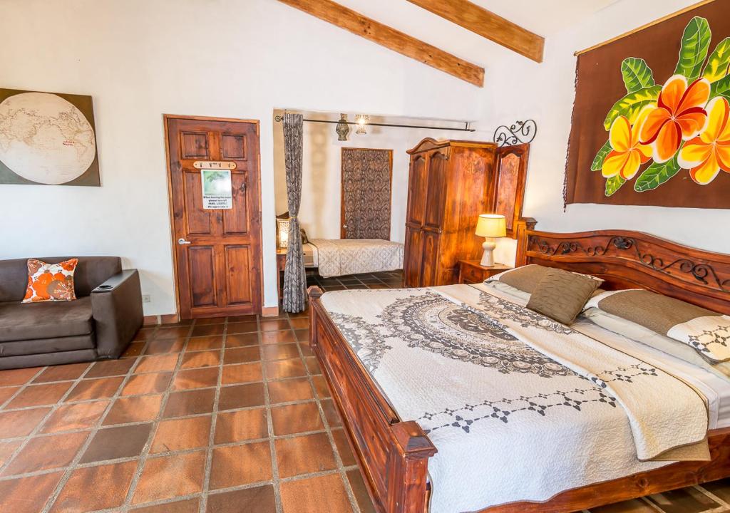 Postel nebo postele na pokoji v ubytování Villa Margarita