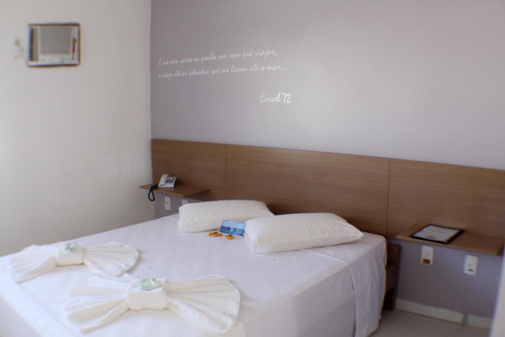 Postel nebo postele na pokoji v ubytování Hotel Abrolhos