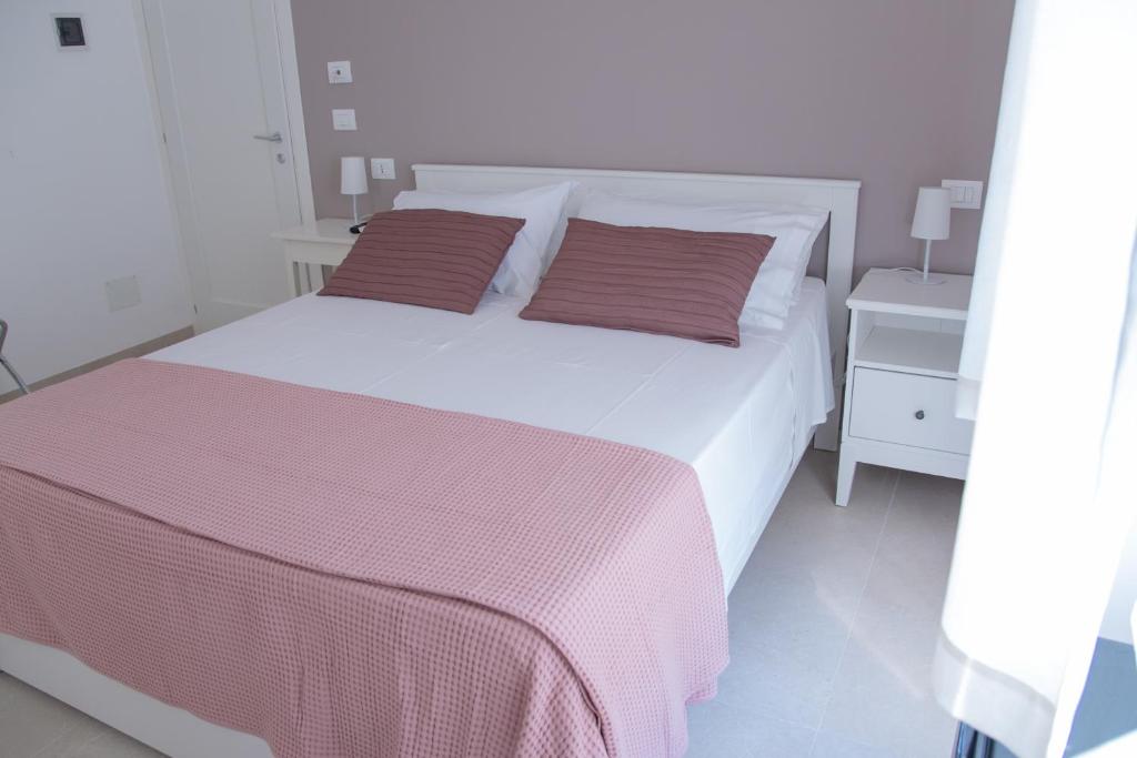 Postel nebo postele na pokoji v ubytování Casa Thuja