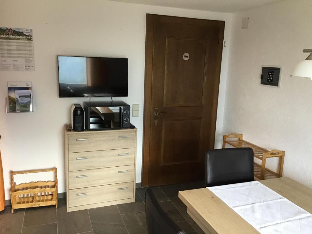 A television and/or entertainment centre at Haus Resi