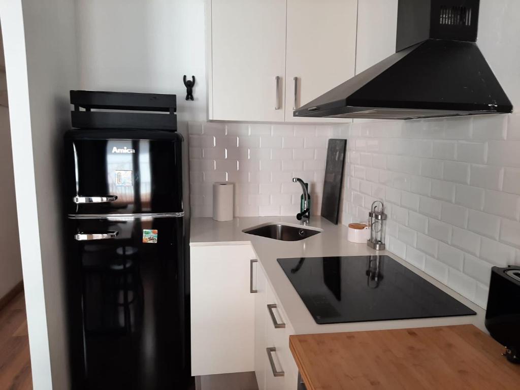 Kuchyň nebo kuchyňský kout v ubytování Apartamento Centre Blanes
