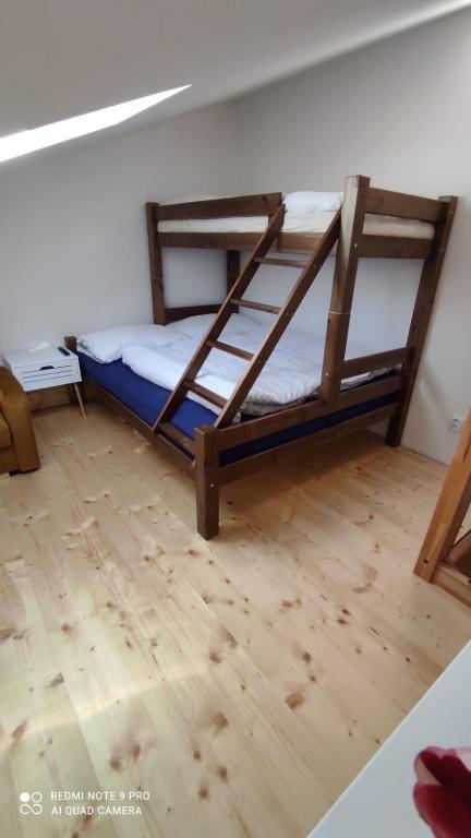 Postel nebo postele na pokoji v ubytování Domeček ve dvoře
