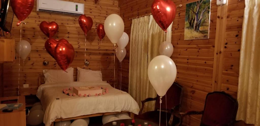 Postel nebo postele na pokoji v ubytování Amirim Atmosphere