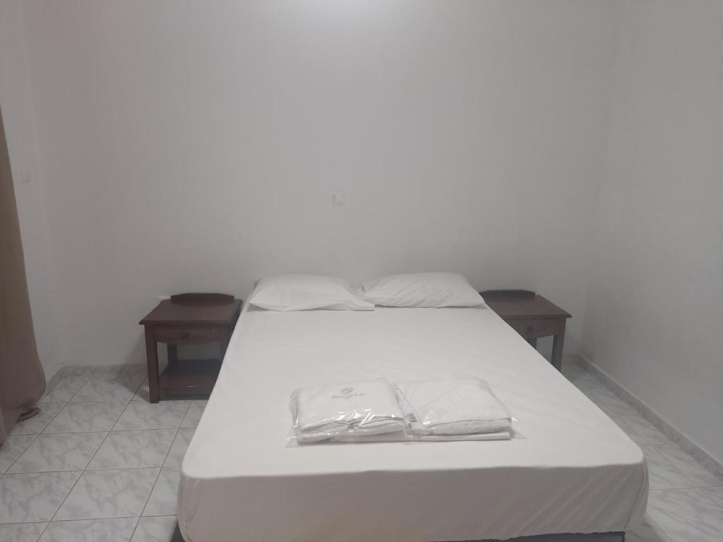 Postel nebo postele na pokoji v ubytování Summertime Apartments