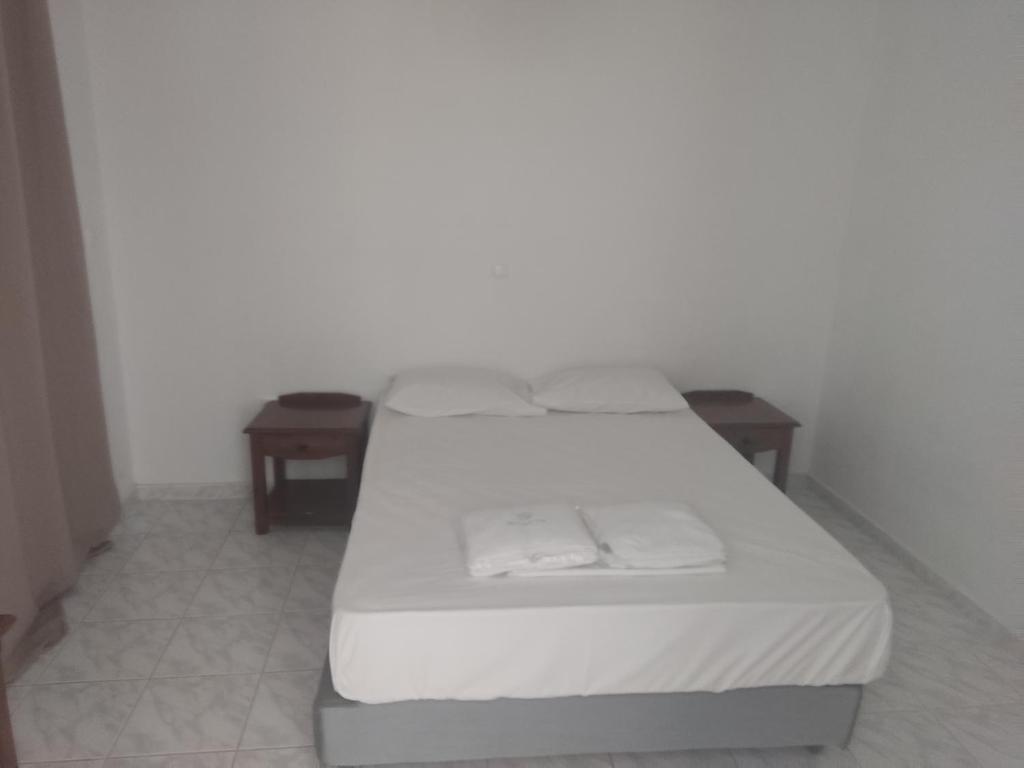 Postel nebo postele na pokoji v ubytování Summertime Apartments