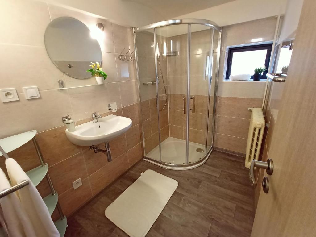 Koupelna v ubytování Apartmany Železná Ruda