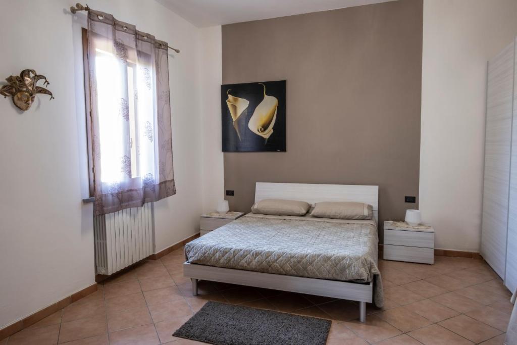 Postel nebo postele na pokoji v ubytování B&B La Serra