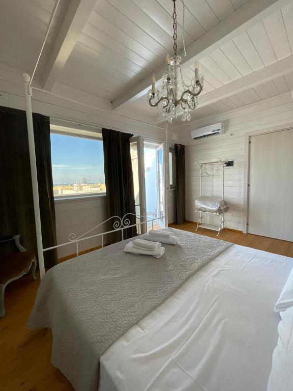 Postel nebo postele na pokoji v ubytování palazzinApulia