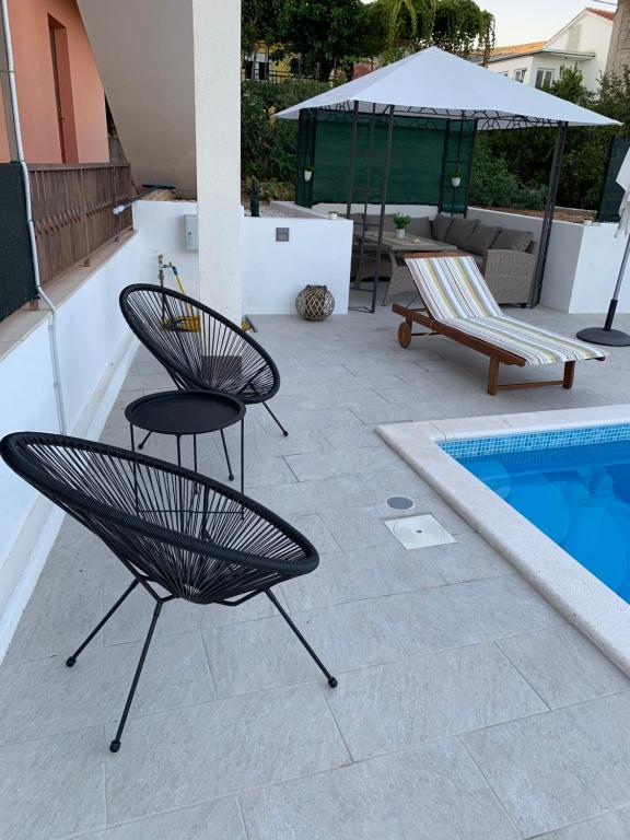 Bazén v ubytování Apartments Villa Bella Vista Seget nebo v jeho okolí
