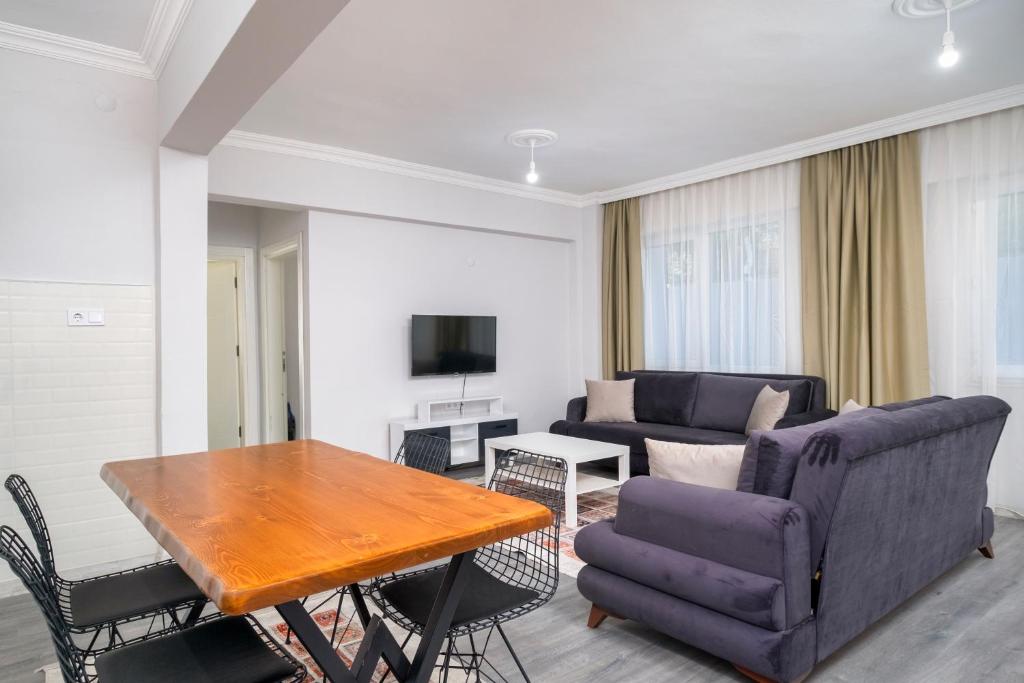 TV a/nebo společenská místnost v ubytování Kagan Holiday Apartments