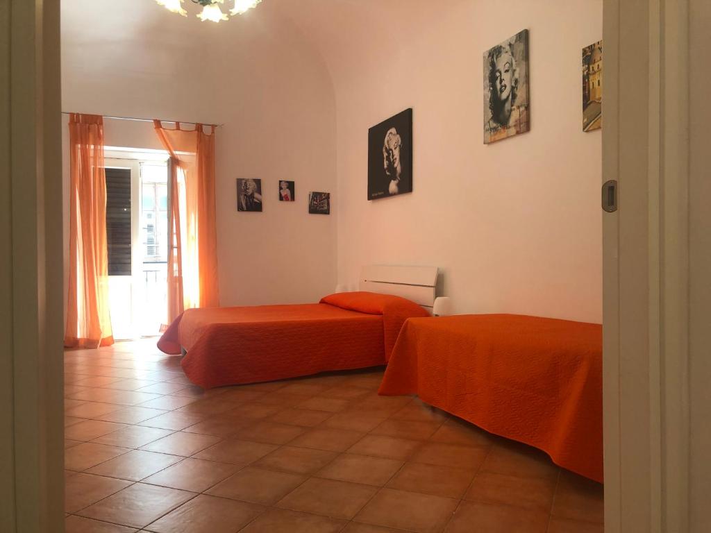 Katil atau katil-katil dalam bilik di Casa arancio