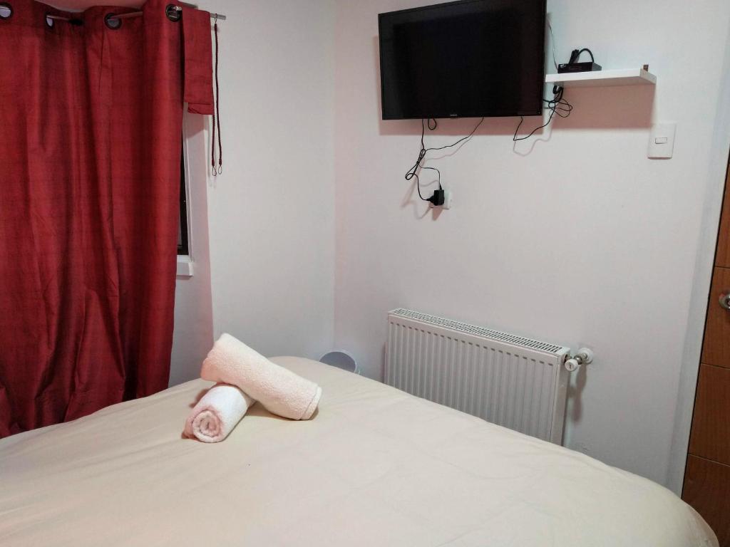 Postel nebo postele na pokoji v ubytování Patagon Backpackers