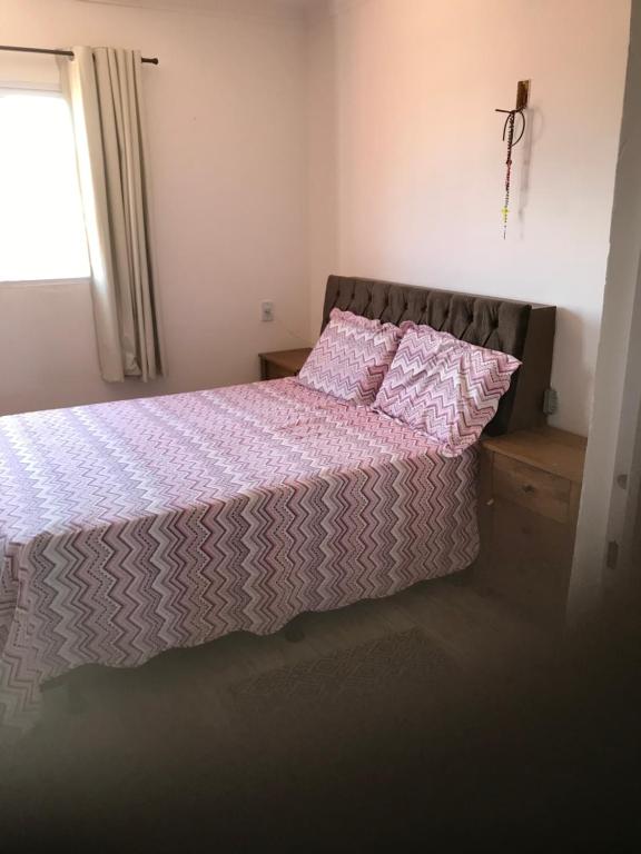 Postel nebo postele na pokoji v ubytování Pousada O Mineiro - frente a praia