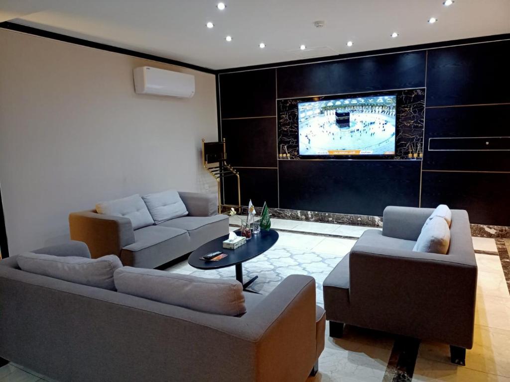 TV a/nebo společenská místnost v ubytování RAK Hotel Apartments