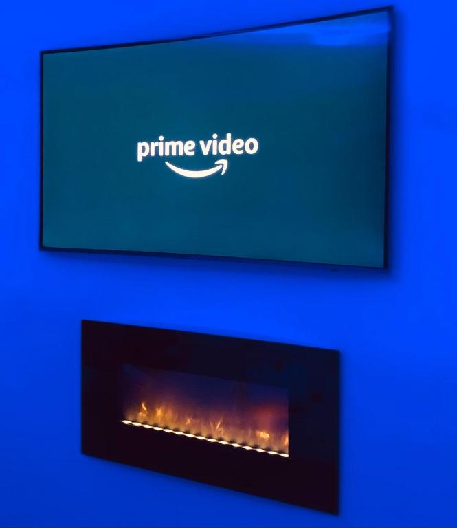 TV a/nebo společenská místnost v ubytování Assisi Luxury SPA Suite Superior