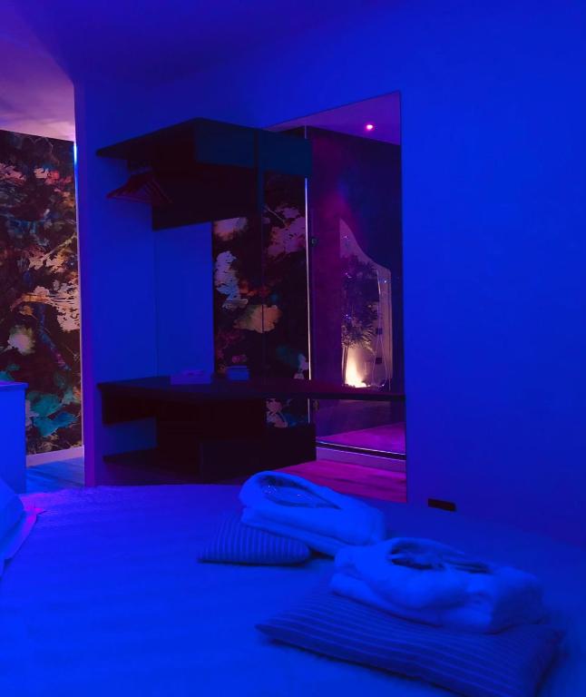 Postel nebo postele na pokoji v ubytování Assisi Luxury SPA Suite Superior