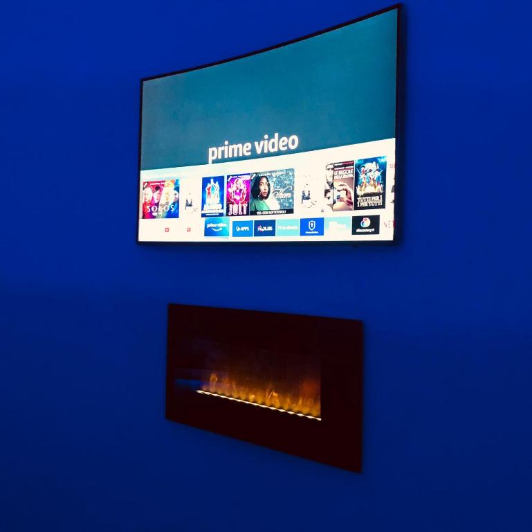 TV a/nebo společenská místnost v ubytování Assisi Luxury SPA Suite Superior