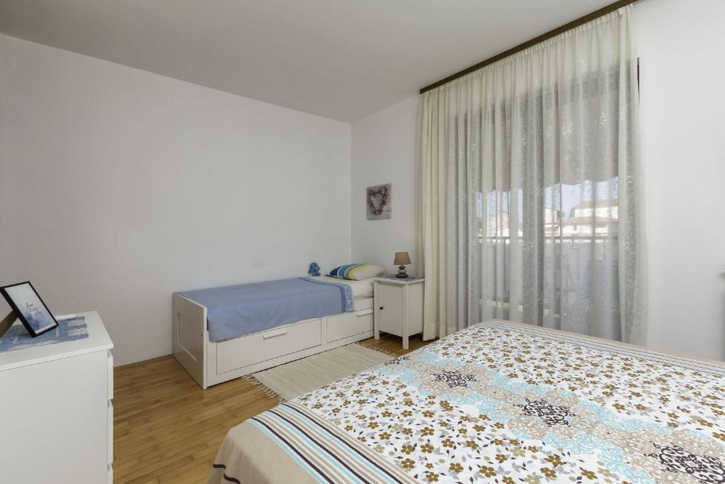 Postel nebo postele na pokoji v ubytování Apartments Istra Croatia