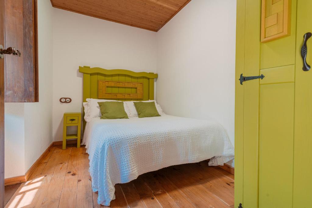 Postel nebo postele na pokoji v ubytování Casa Escondida Aveiga