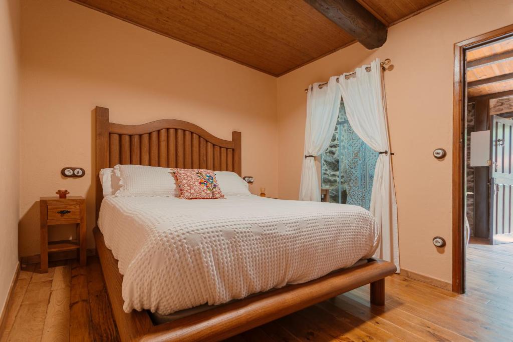 Postel nebo postele na pokoji v ubytování Casa Escondida Aveiga