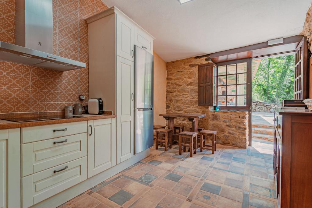 Kuchyň nebo kuchyňský kout v ubytování Casa Escondida Aveiga