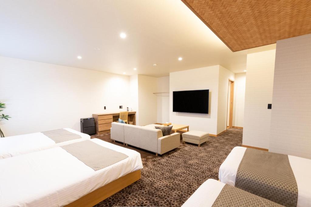 TV a/nebo společenská místnost v ubytování Chiyokura HOTEL SHUKU Nagoya