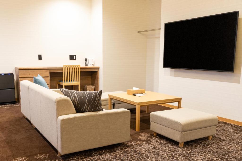 TV a/nebo společenská místnost v ubytování Chiyokura HOTEL SHUKU Nagoya