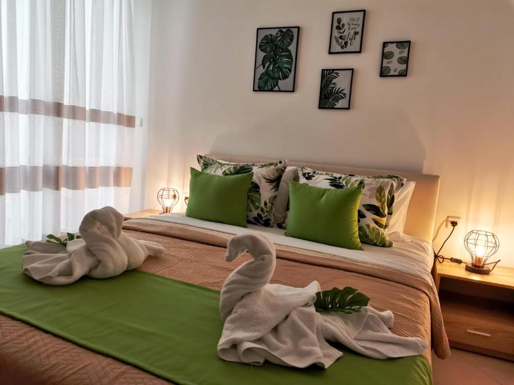 Posteľ alebo postele v izbe v ubytovaní Evris House oasis