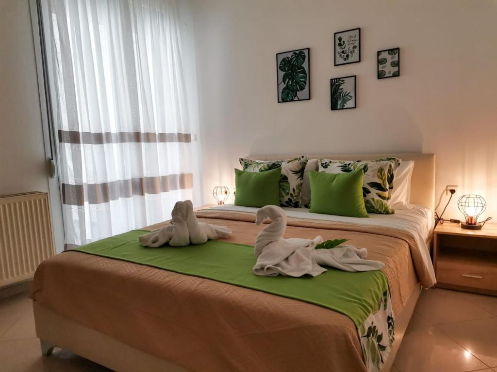 Posteľ alebo postele v izbe v ubytovaní Evris House oasis