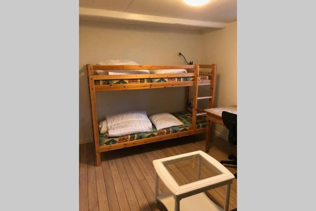 Postel nebo postele na pokoji v ubytování Lækkert byhus i hjertet af Marstal