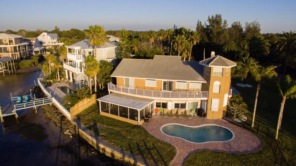 an aerial view of a house with a swimming pool at Florida Villa in Palm Harbor