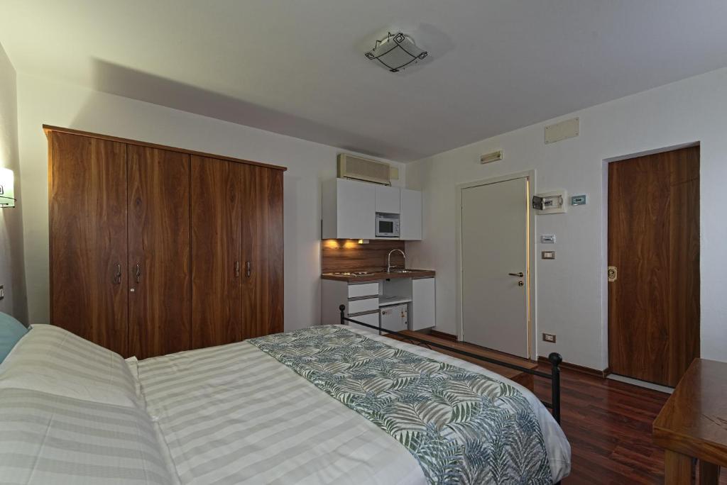 Postel nebo postele na pokoji v ubytování B&B Sognare A Venezia