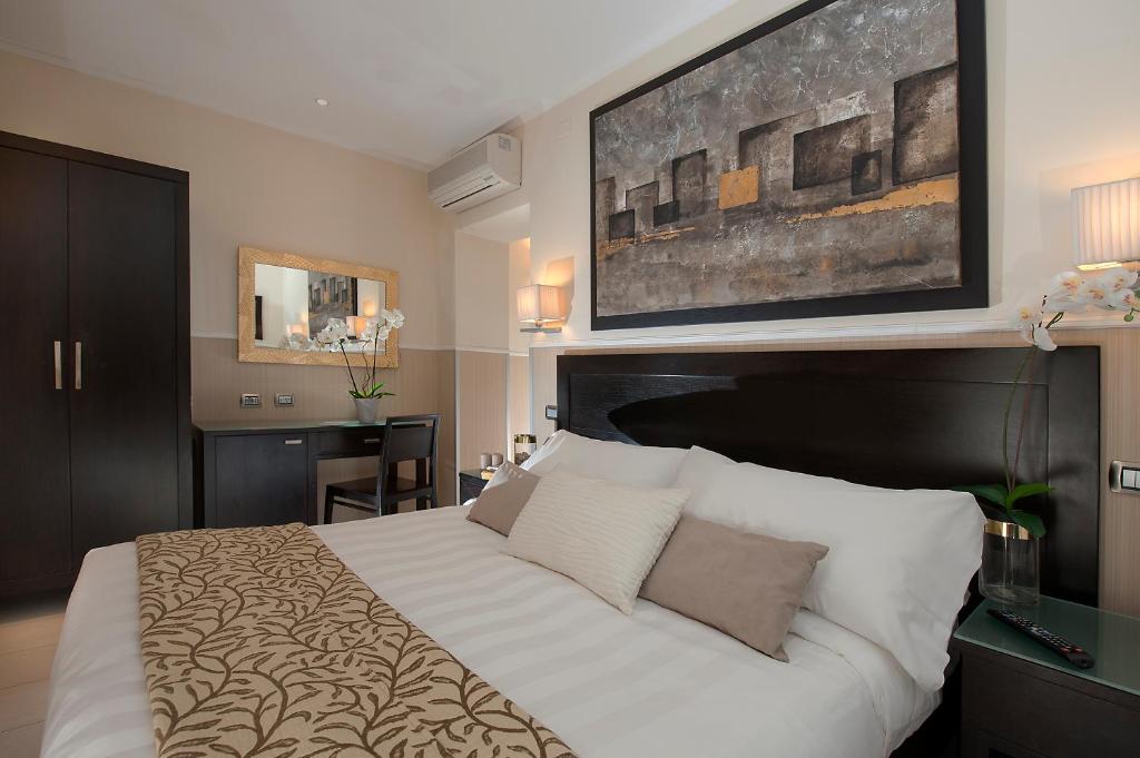 Postel nebo postele na pokoji v ubytování Yes Hotel Boutique Rome