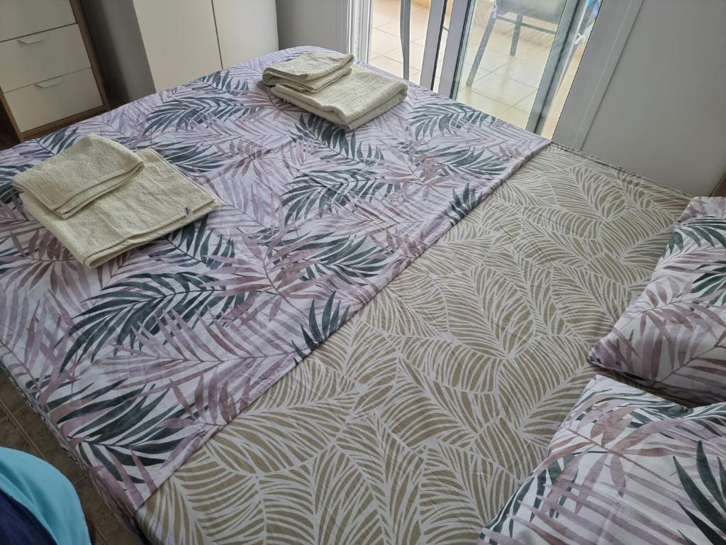 Postel nebo postele na pokoji v ubytování Lucas2 Lux Flogita apartment