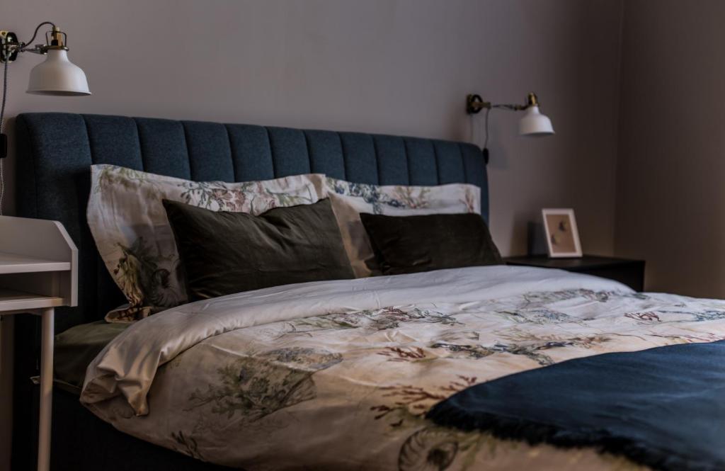 Postel nebo postele na pokoji v ubytování Emily