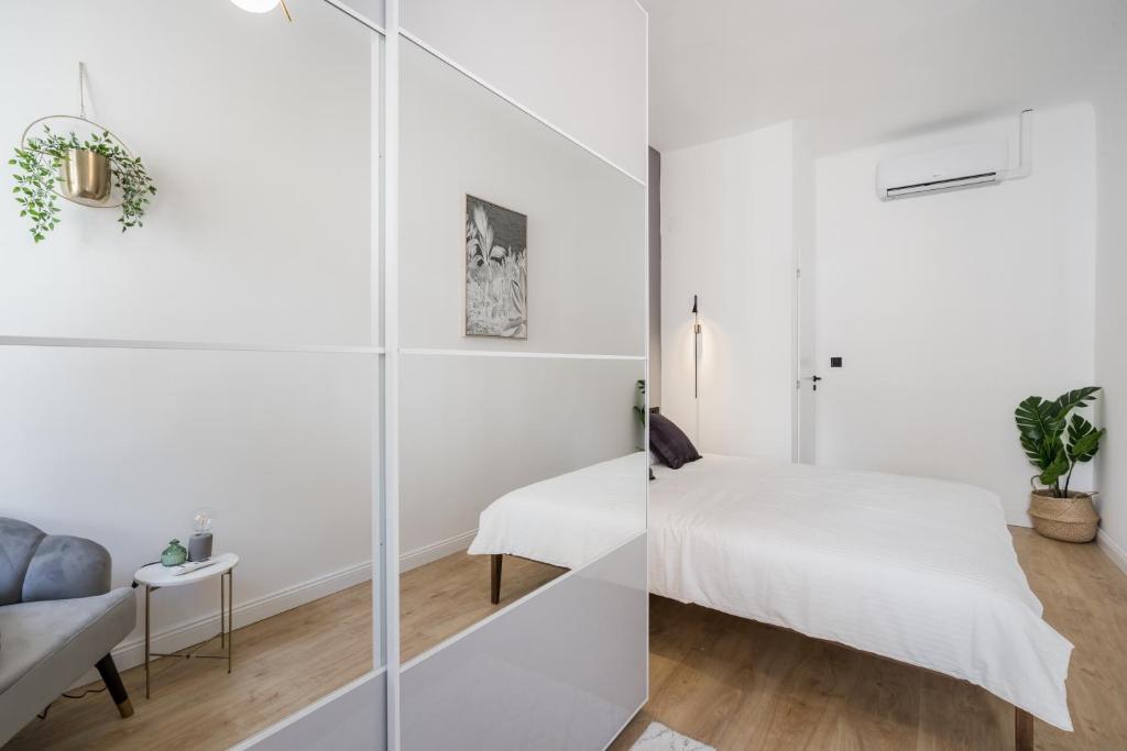 Postel nebo postele na pokoji v ubytování TILIA LUXURY APARTMENT - 3 bedrooms with AC