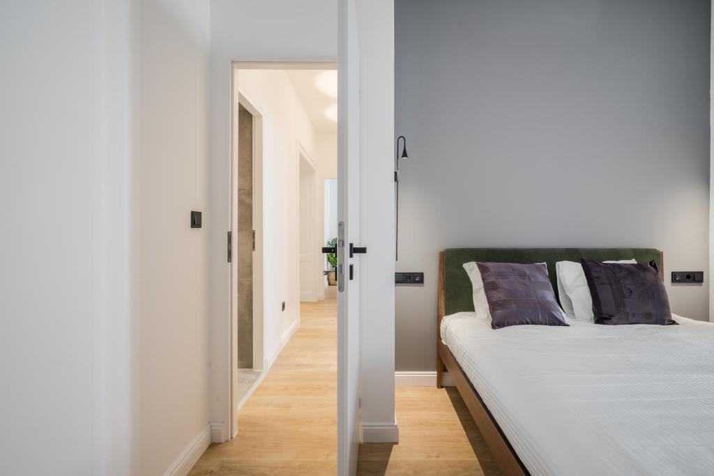 Postel nebo postele na pokoji v ubytování TILIA LUXURY APARTMENT - 3 bedrooms with AC