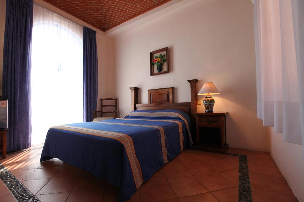 Postel nebo postele na pokoji v ubytování Hotel Lunata - 5th Avenue