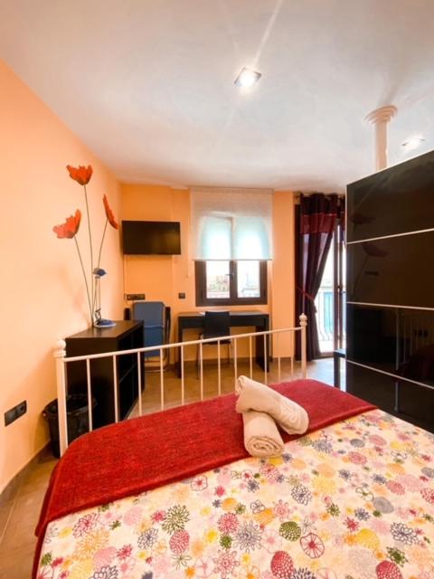 Postel nebo postele na pokoji v ubytování Apartamentos Turisticos Graus
