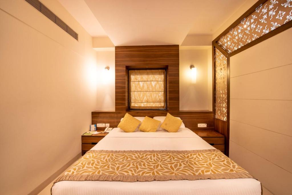 Postel nebo postele na pokoji v ubytování La-Paz Gardens Beacon Hotel - Vasco da Gama Goa