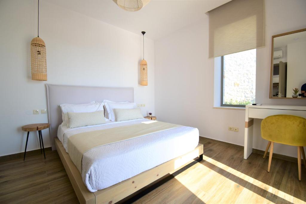 Posteľ alebo postele v izbe v ubytovaní Kallixeni Villas
