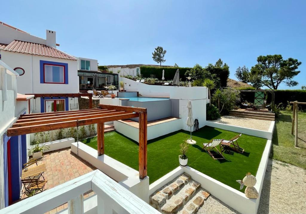 a view of the backyard of a house at Casas Do Moinho - Turismo De Aldeia in Odeceixe