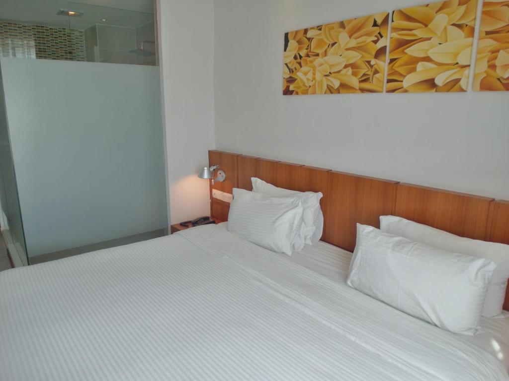 Postel nebo postele na pokoji v ubytování French Hotel
