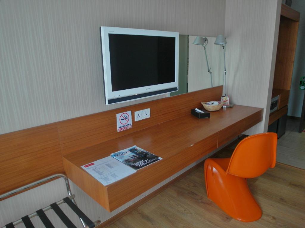 TV a/nebo společenská místnost v ubytování French Hotel