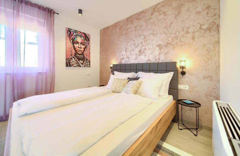 Postel nebo postele na pokoji v ubytování Apartment Timmy