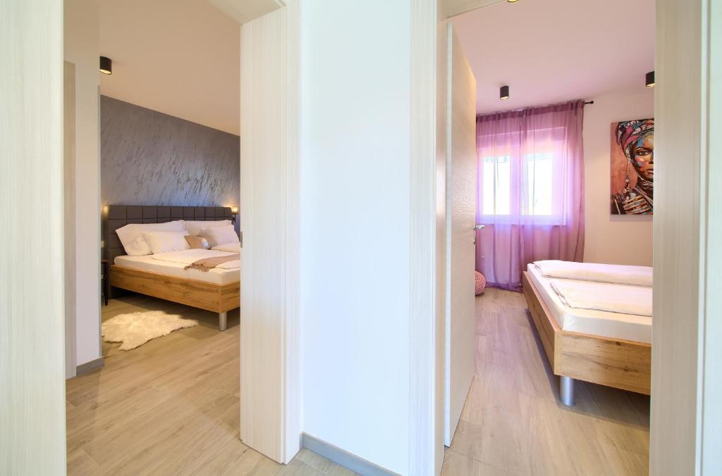 Postel nebo postele na pokoji v ubytování Apartment Timmy